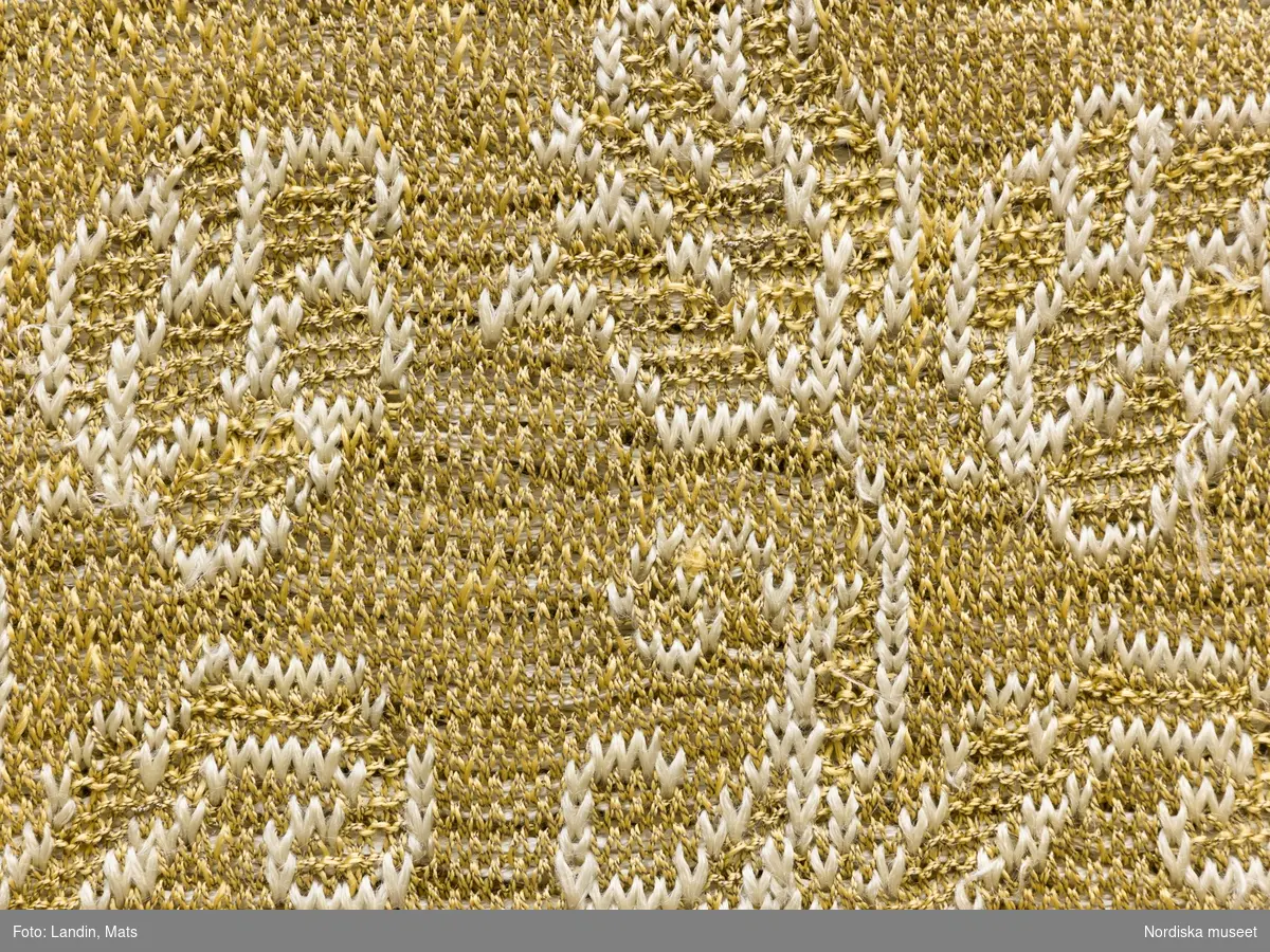 Tröja av gult silke. Silketröja. 1600-tal. 
NM  inv.nr 221941