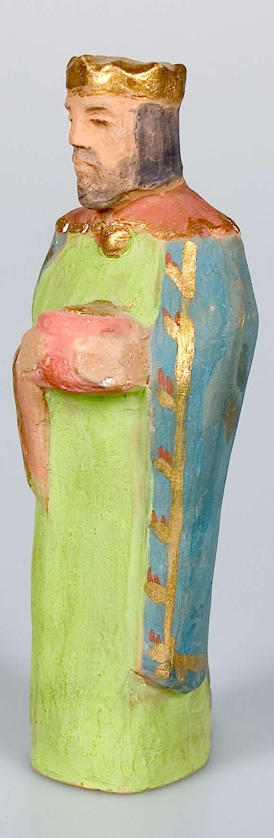 Tjugo lergodsfigurer till julkrubba. De flesta figurerna är märkta B-4252.
I gruppen ingår Maria med Jesusbarnet, Josef, tre vise män, herdar, människor med gåvor, änglar, får, en elefant och en kamel. Elefanten är till skillnad från de andra figurerna obränd. De flesta figurerna är målade. Maria med Jesusbarnet är målad i blått, rosa-lila och guld. De tre vise männen är målade i bland annat guld, grönt, blått och gult. Övriga figurer har en mer sober färgskala.
Figurerna har varierande mått. Den längste av de tre vise männen är 20,5 cm hög. De små änglarna är bara 8,5 cm höga.