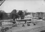 Reprofotografi - vy från öster mot Pumphuset och Islandsbron, Fjärdingen, i bakgrunden Uppsala slott, Uppsala före 1901