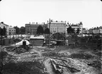 Bygget av Vaksalaskolan har påbörjats, Vaksala torg, Uppsala 1925