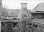 Rivning av bostadshus, Klostergatan - Östra Ågatan 15, Uppsala oktober 1935