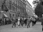 Medborgartåget på väg från Vaksala torg till nationaldagsfirandet på Studenternas Idrottsplats