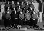 Grupporträtt på medlemmar i Frälsningarméns musikkår, Uppsala, oktober 1933