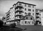 Bostadsrättsföreningen Islandsgården under byggnation, kvarteret Örnen, Östra Ågatan - Bäverns gränd, Uppsala oktober 1936. Delar av krogen 