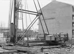 Uppsala stadsbibliotek och Centralbadets simhall under byggnation, Östra Ågatan, Uppsala april 1940