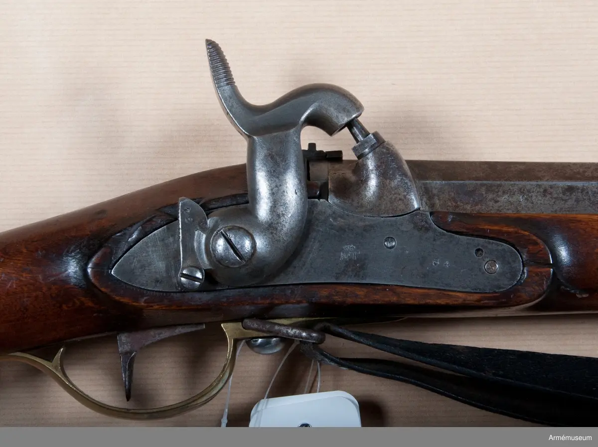 Flintlåset ändrat till slaglås. Låset tillverkat i Norrtälje.