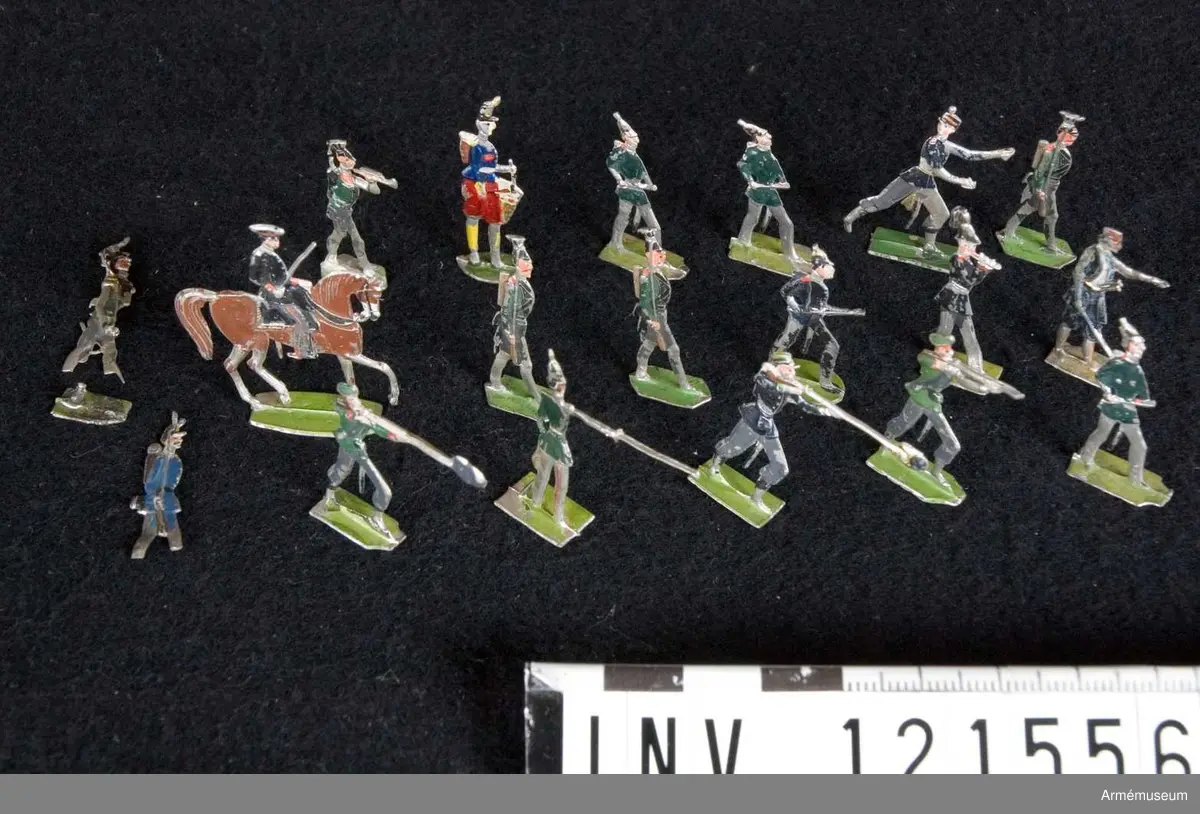 Föreställer infanterister och musiker, ca 1860-70.