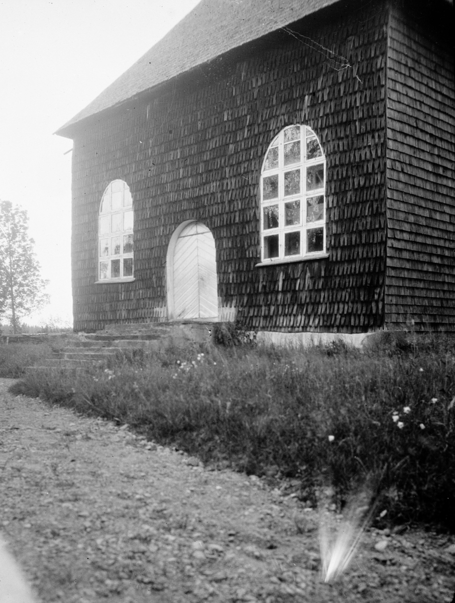 Oidentifierad kyrka
Spånklädd kyrka
Exteriör