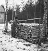 Björnsö skogsskifte
Skogsarbetare vid vedstapel