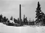 Bostadsområde, panncentral
Exteriör, panncentral vid flerbostadshusområde i vinterlandskap.