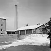 Panncentral
Exteriör, panncentral vid bostadsområde med rök som stiger mot himlen. Vinterbild.