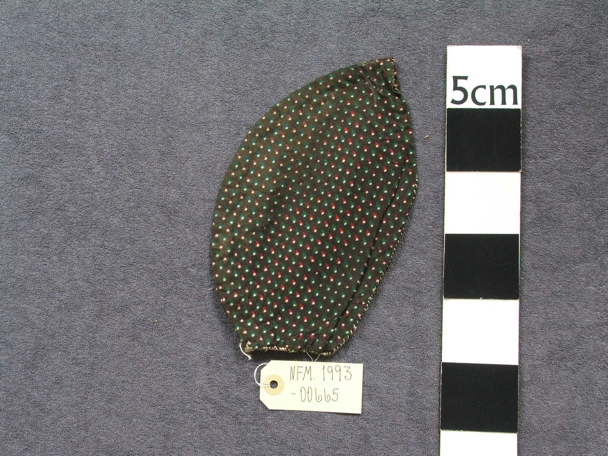 Dråpeformer med kvit prikk nedst i dråpe.