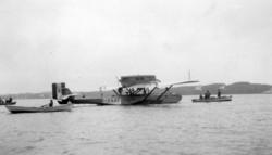 Sjøfly/flybåt merket:" I-XAAF" og med navnet "Marina" omgitt
