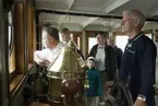 Museichef Klas Helmerson vid rodret på isbrytaren Sankt Eriks kommandobrygga.