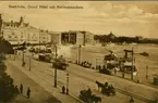 Stockholm, vy över Södra Blasieholmshamnen från norr med Grand Hotel och Nationalmuseum i bakgrunden. Vykort.