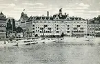 Stockholm. Södra Blasieholmshamnen med Grand Hotel i bakgrunden. Vykort.