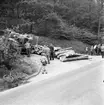 Långtradare med stockar som last välte på Ådalsvägen i Huskvarna den 14 juni 1956.