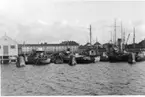 Oljefabrikens exteriör före omändringen i september 1946.
Lindholmsbron till höger på bilden före ombyggnaden