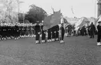 Bilden visar en militär ceremonie på stortorget i Karlskrona.