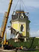 Strömsborg. Rivningen av huset och lyftet av tornet för flytt.