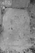 Inristning i sten i kyrkoruinen.  Lagmansered