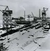 Oskarshamns varv. Motorfartyget MORVIKEN (Byggdes1936) på bädd den 23.12.1955 efter snöfall.