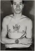 Tatueringsbilder.

Matros Folke Björklund.
bröstbilden utförd i Grimsby 1931.
Ankaret på höger hand av Carl Gustafsson (