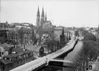 Vy över Fyrisån vid kvarteren Munken och Kaniken, Västra Ågatan, Uppsala 1939