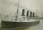 Leaves New York
A photo of th SS Aquitania, taken as it pulled out, to go to Southampton, England.
KT 14-16