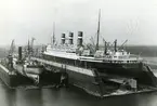 STATENDAM 30.000 tons of the Holland-America Line and SS Blitar 10.300 tons, of the Rotterdam Lloyd in our Docks at Schiedam.