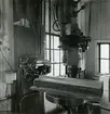 Filkammaren. Borrmaskin, /bultlåsmaskin/.