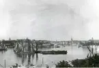 Vy över en del av Stockholm taget från Strandvägen 33.
Fotot taget i juni månad 1931.