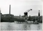 Fotodatum 1933-03-30. fartyget passerar Hammarbyverken på ingående mot Mälaren.