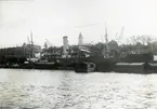 Sv. Ostasiatiska Komp:s M/S Canton lastar, 1928.