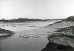 Stranden på Pålholmens norra sida gav ett skydd för uppdragna skötbåtar.