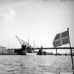 Göteborgs hamn juni 1940. Gullbergskajen vid nya Göta älv bron med S/S Titania av Stockholm. Fil Gunnar Jonssons undersökningsresa till västkusten juni 1940. 189