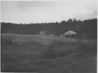 Vy över gård.  Håbol