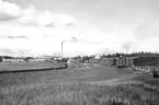 Wargöns AB.

Wargöns pappersbruk, hamnen med virkesmosor vid virkeslagret, 1948.