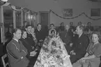 Julbord på marketenteriet på F 3 Östgöta flygflottilj, julafton 1941. Dukat bord med gäster.