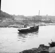 Raset vid Göta Cellulosa 7.6.1957. Båten Perle av Aalborg.