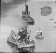 Raset vid Göta Cellulosa 7.6.1957. Båten Perle av Aalborg.