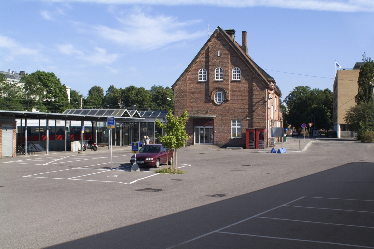 This is the story of how Norway’s most important conversation-space was designed by a young, freshly graduated man from Bergen.

“Norwegian architects are hereby invited…”
In the autumn of 1932, Oslo Telefonanlegginitiated an architectural competition. Finally, Oslo would get its own telephone booth. The city had had so called “talking-stations” from 1885, which in turn were overtaken by automatic telephones 
 only available at selected Narvesen kiosks. The state 
was of the opinion that now was the time to offer the public a better service; public telephone booths open 24/7, like the ones they already had in Sweden and England. But what would they look like, these new telephone booths? What considerations would it
 be necessary to take when designing it? The telegraph board developed a detailed list of demands and restraints: “The booth is intended to be placed outside on the streets and squares and need to be designed so that snow and ice does not hinder the opening and closing of the doors,” they wrote. “To prevent vandalism, theft, uncleanliness etc. inside the booth, it needs to be designed so that from all angles one may see what is going on in there.” Additionally, it would need to withstand storms and bad weather, and “preferably also being whipped by rain mixed with seawater” 

This was not all: The appearance would have to be «pleasing». The booth also needed to be movable, so that it could be taken in to be serviced at Telegrafverket’s main workshops. The reqired material was iron, and the surface was to be spray painted  preferably using car-body paint. There was a requirement for “a writing shelf, a pack shelf, and a suitable place for the telephone catalogue.” Also, there would need to be an illuminated TELEFON  sign, easily visible from all four angles. The total cost for each booth should not exceed 1000 kroner. The first prize for coming up with such a product was 800 kroner.

“Norwegianarchitects are hereby invited to partake in a competition for the design of a telephone booth…”  

The man with the solution
«At some point in 1932, Georg Fredrik sat at a party in Bergen. Maybe he felt a bit lost and forgotten as he often had throughout his life. He retreated to a quiet corner, took out a pencil and strted doodling on a matchbox.  According to my mother, this was how the telephone booth came into being.” In the book “Norges lille røde  historien om telefonkiosken,” Lars Fasting describes his father, the man who is far less known than the iconic architctural structure he left behind. Georg Fredrik Fasting was from Bergen, born into a family of working people and smallholders. One unusual facet of Georg Fredrik was that he was born without ears. His mother made sure he learnt to speak, read and write, 
ut Lars Fasting indicates that his father would seek refuge in drawing when the social challenges became too much to bear. And in the end drawing became his profession. In 1924 he secured a guarantor for a student loan, and started studying to become an a
rchitect at the NTH. Throughout the 1930s he entered several architectural competitions, with drafts produced, according to his son, “after work and in the late hours of the night.”

His efforts were not wasted. Out of 93 entries, with names such as “Flirt”, “Brrr”, “Ring” and “Amor”, the jury selected Fasting’s submission, “RIKS” as the new telephone booth: “The draft shows a strikingly simple solution to the task, technically as well as aesthetically well worked out.”

Taut and provident
Simple and aesthetc are the keywords here. Fasting had designed a booth pointing towards the future, and to modernism. Just how modern it was can be seen by comparing RIKS to the British telephone booth, also designed in the interwar-era. While the British version with it classicistic style is looking back to the heyday of the empire, Fasting’s booth is progressive and functionalistic. Like most Norwegian architects, Fasting broke with the classicistic style of architecture after the Stockholm-exhibition in 1930. “After it, almost all buildings erected in Norway until the German invasion in 1940, were in the functionalistic architectural style,” writes senior curator of architecture at the Norwegian National Museum, Ulf Grønvold, in the book, “Den lille røde”.“TheNorwegian booth is a piece of functionalistic architecture, an asymmetric composition with its roof slab overhanging the word TELEFON, in bold sans seraph lettering,”concludes Ulf Grønvold.

Fashionably red
And it was red. Fasting chose a colour which was part of the modern palette. “A bright red colour, but not as shiny as a signal red, the character of the colour places it among the fashionable colours within functionalism,” states paintings conservator and researcher in NIKU (Norwegian Institute for Cultural Heitage Research), Jon Brænne. In his opinion, Fasting went for visibility without making the booth stand out too much from its surroundings. The original colour was in use up to around 1950, when it changed to signal red. Towards the end of the 1970s the clour was again adjusted towards today’s orangey red.

The design, however, has not changed. RIKS is eighty years and still looks remarkably good. That’s what makes Fasting’s telephone booth a classic  even before it was added to DOCOMOMO’s list over moden icons of design. For Telenor, the telephone booth has served as a pathway into the hearts of the public. For many, Telenor (Televerket) was synonymous with exactly this telephone booth, because this was where one would go to place a call. Having a home
phone was not common until the 1980s. As such the red box became part of the Norwegian everyday and consciousness. The symbol- and publicity value of this is hard to evaluate, but in 2007 it was time to give honour where honour was due, Telenor, in consul
tation with the Directorate for Cultural Heritage, decided to preserve 100 telephone booths for all eternity.

And what about Georg Fredrik Fasting? What happened to him? At the age of 56 an entry in his diary states: «I CAN HEAR». As the first person in th world he had undergone an operation where he had ear canals constructed and eardrums fitted. For the rest of his life, the man behind Norway’s own telephone booth could answer the telephone himself.

Source: Norges lille røde historien om telefonkiosken (2007), issued by The Norwegian Telecom Museum and Telenor Cultural Heritage.