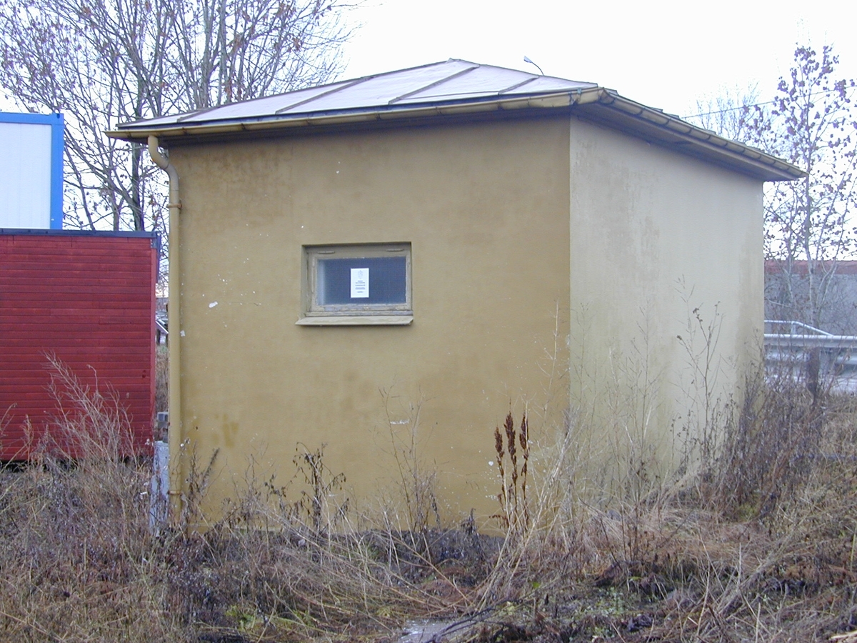 Auli kabelhus er bygget med pusset mur i nyklassisk stil. Det har pyramidetak tekket av sinkplater. Døren og vinduene har opprinnelig vært fremhevet i strukket puss.