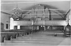 Kyrkan interiör orgelläktaren  Stora Mellby