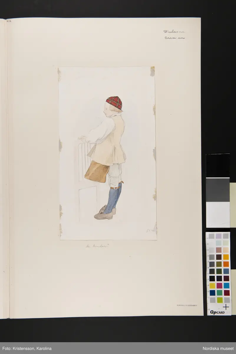 Pojke med skinnförkläde. "Ax. Ender?"