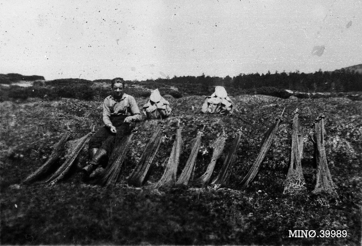 Mann med fiskegarn