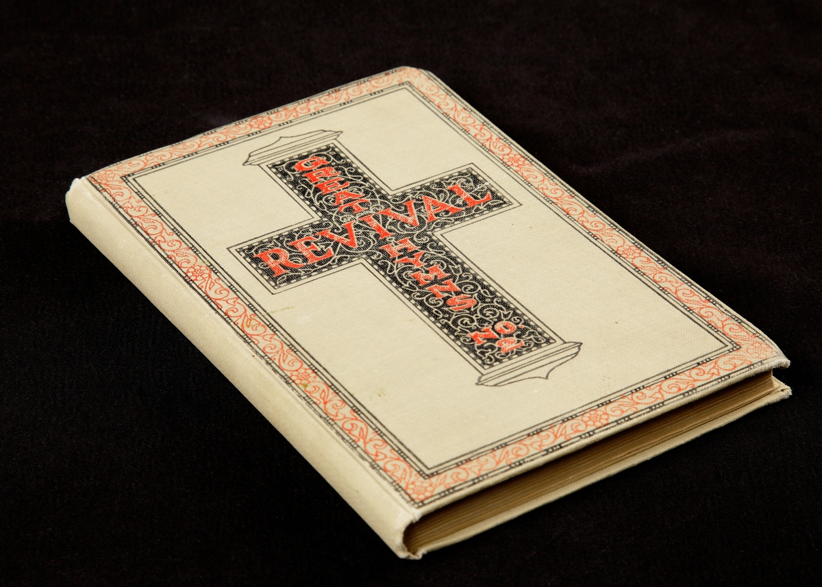 Religiös sångbok med engelsk text. "GREAT REVIVAL HYMNS No 2". För kyrkan, söndagsskolan och evangeliska gudstjänster. Inbunden i ett styvt kulört band, olivgrön botten, svart kors med röda bokstäver. Både rött och svart runt korset.

Inskrivet i huvudkatalogen 1997.