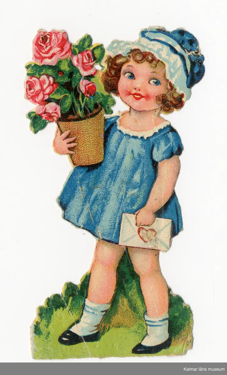 KLM 28620:13:1-2. Bokmärke. 2 stycken. Tryckta i bjärta färger och glansade. :1 flicka med blomsterkorg i handen och på ryggen. På baksidan står: "från Ann Sofi". :2 flicka som håller om en blomkruka med rosor och ett brev i andra handen. Något stukade. Bokmärken hittade i boken KLM 28620:10.