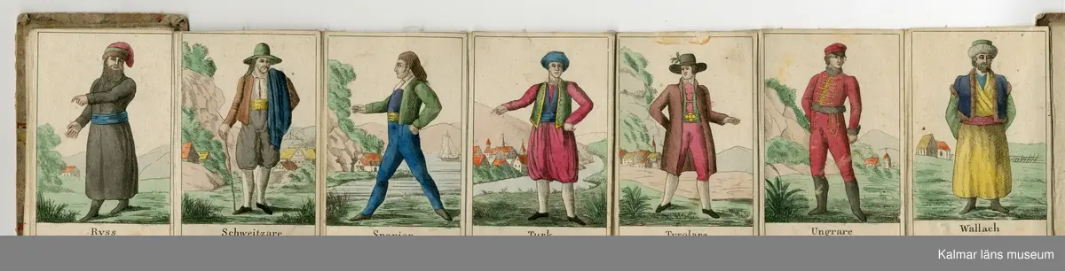KLM 25440. Album. Litet album med pärmar av papp klädda med marmorerat papper. Inuti 24 tryckta färgbilder föreställande olika nationaliteters klädedräkter. Skrivet på insidan av pärmen: Gahn.