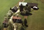 Flygfoto över fastighet Klockaregård 1 i Myresjö, Vetlanda kommun.
